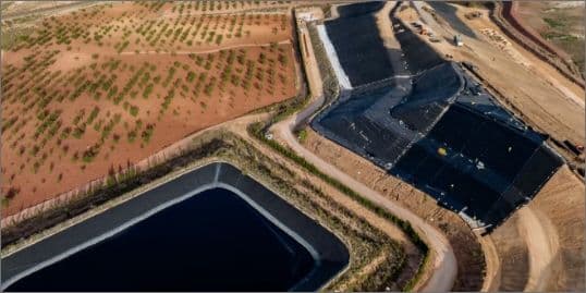 Efficient landfill capping achieved through innovative rainwater drainage, gas collection, and slope stabilization solutions