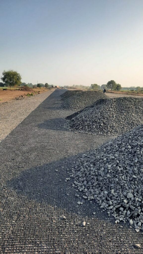 Aggregates for backfilling geogrids