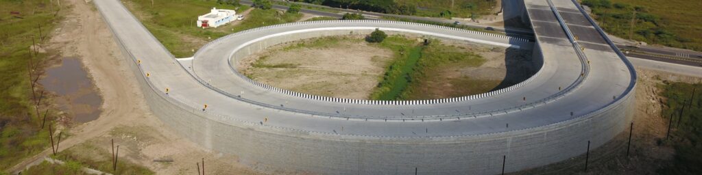 Constructed curved reinforced soil wall for NH- 227 using StrataGird and StrataBlock