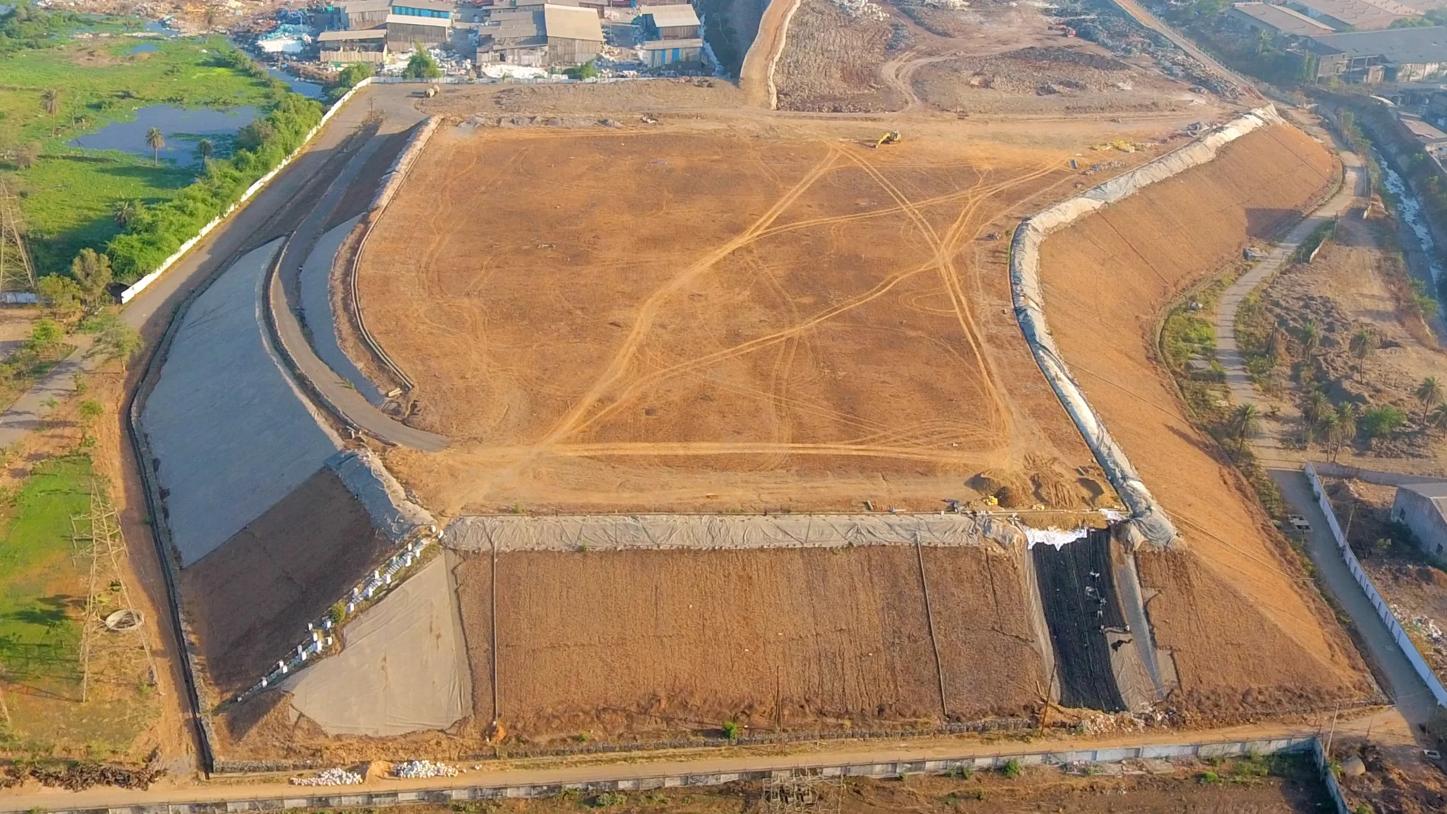 Vertical landfill solution, utilising StrataSlope® and StrataBlock™ systems maximising space for waste management.