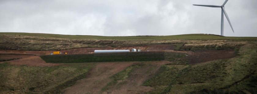 Steep slope platform reinforced using StrataGridTM uniaxial geogrids and StrataSlopeTM systems on a mountain edge by Strata Global